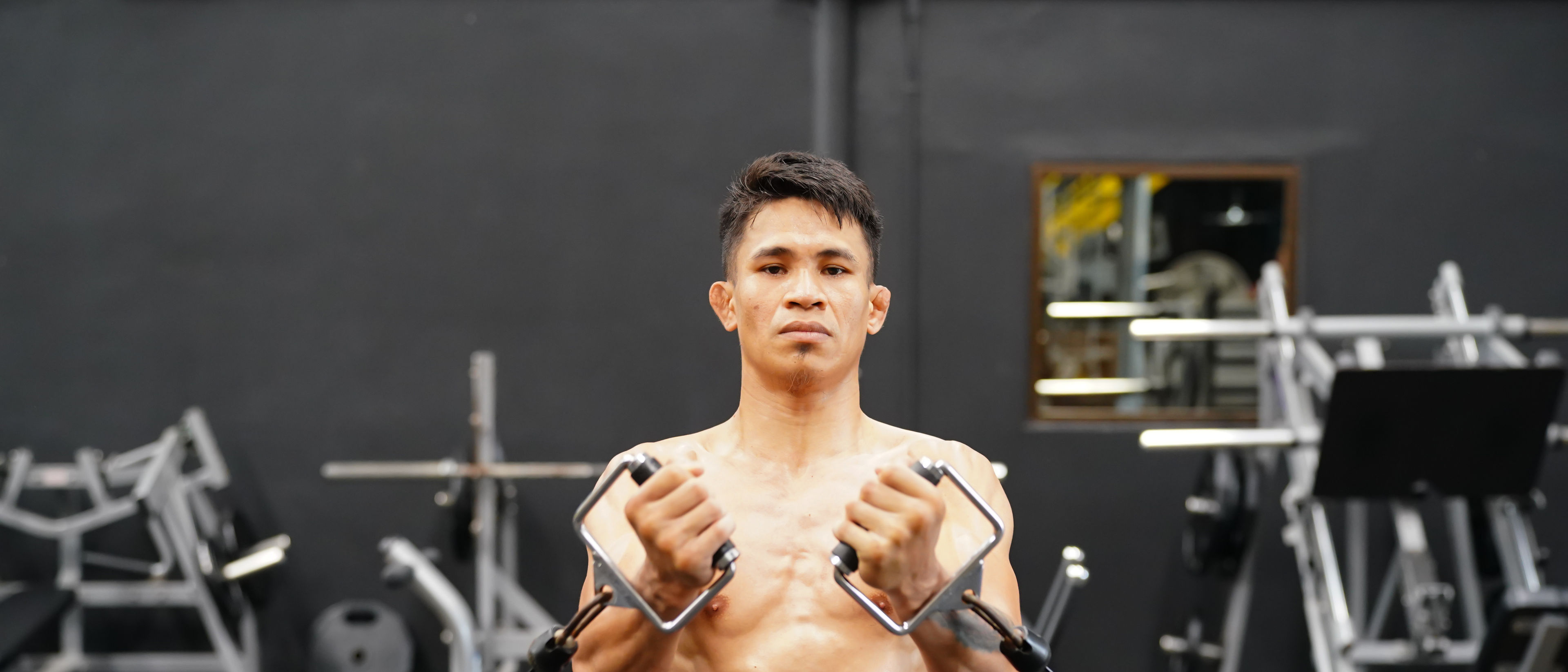 Man doing workout in gym.