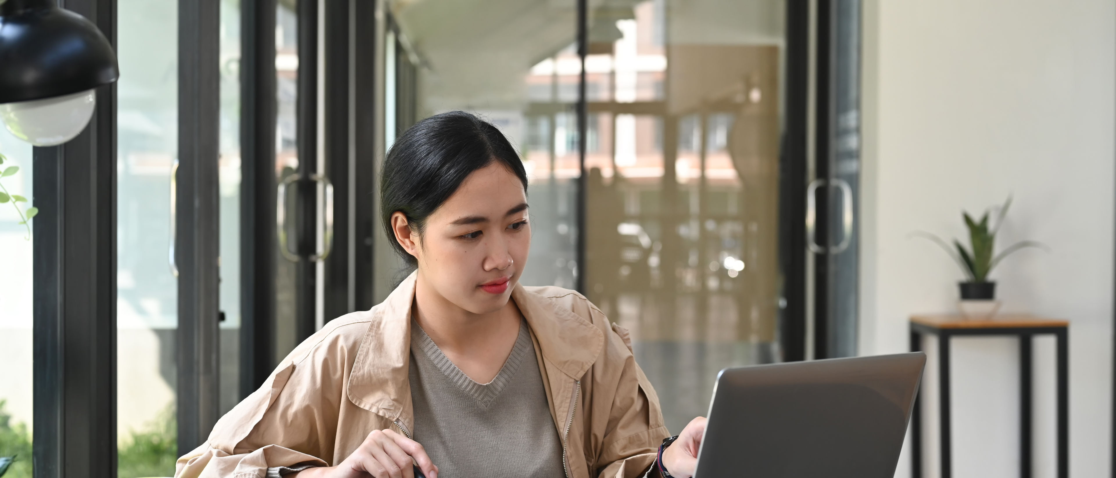 Woman working with laptop.